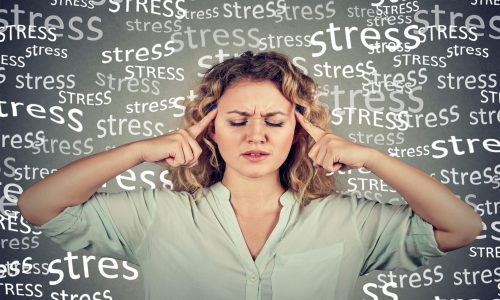 sad young woman with worried stressed face expression